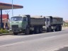 Two old trucks between Shkodër and Tirana 
